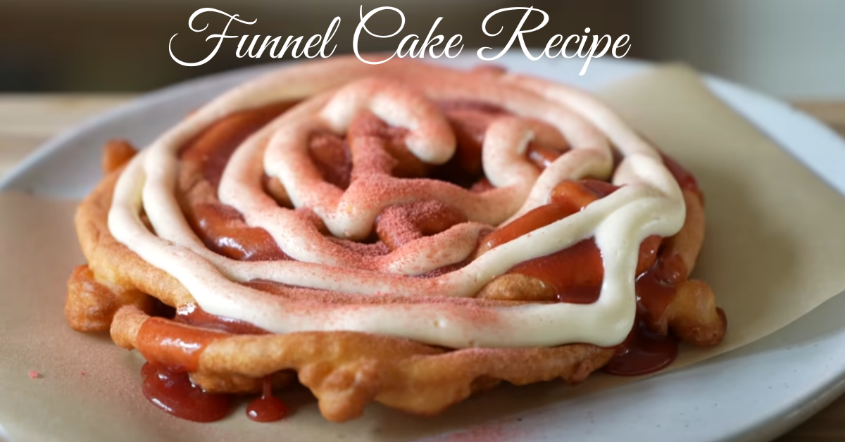 Golden, crispy Funnel Cake Recipe dusted with powdered sugar and served on a white plate.