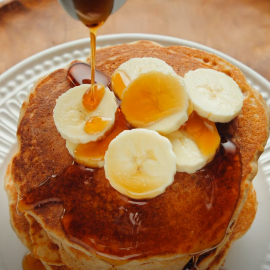 Banana and Whole Wheat Pancakes with Sugar-Free Maple Syrup 2 Fluffy Banana Whole Wheat Pancakes with a drizzle of sugar-free syrup.