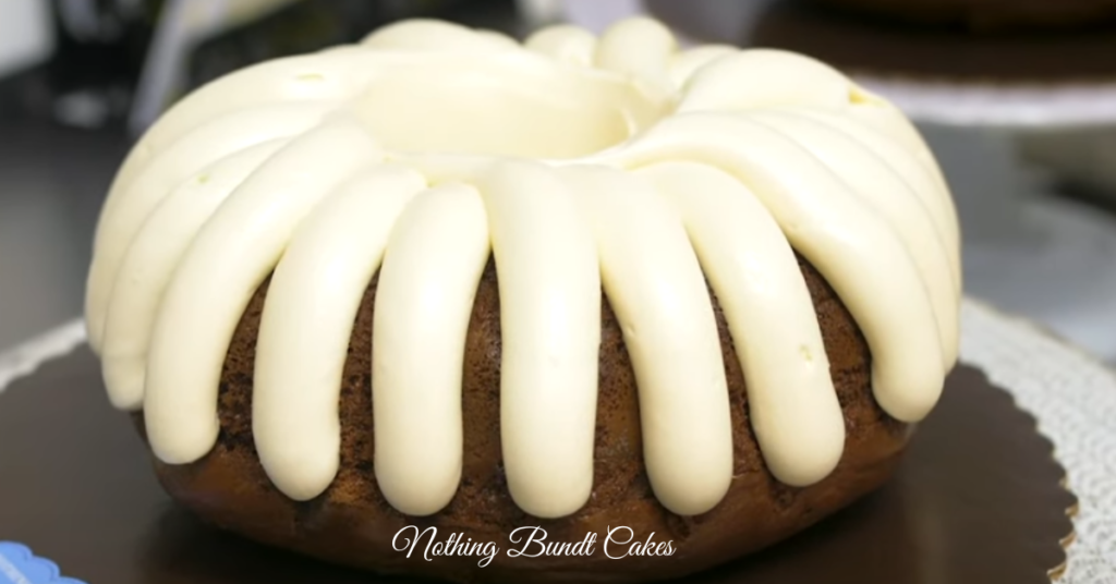 A selection of bundt cakes in various flavors and sizes from Nothing Bundt Cakes, beautifully displayed on a dessert table.