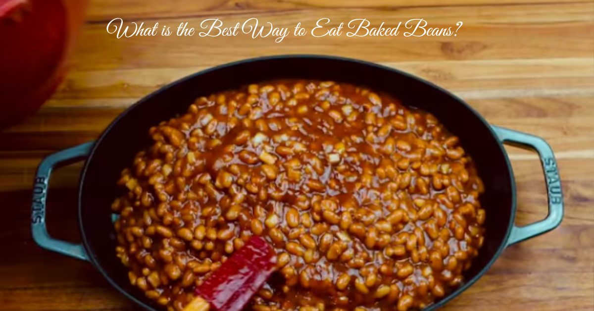 A bowl of baked beans garnished with fresh parsley, served with toasted bread on a rustic wooden table.